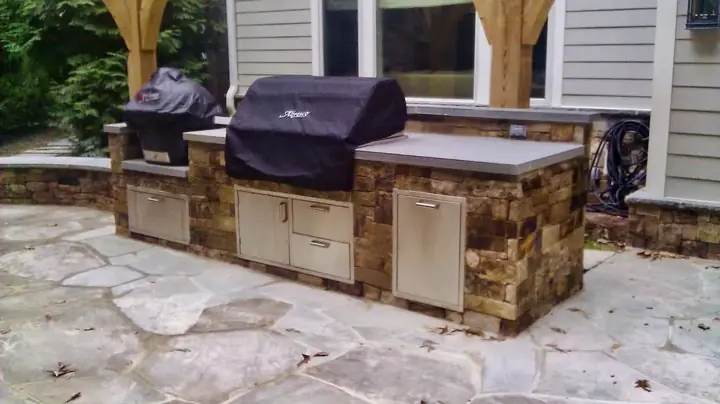 Stone Grill Island — McLean, VA · Stacked Stone & Bluestone Counters
