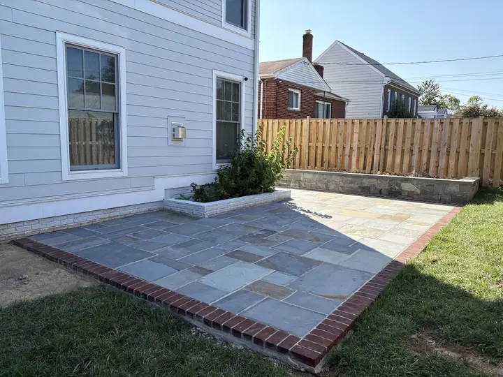 Full-Color Flagstone Patio — Arlington, VA · Brick Border & Stone Wall